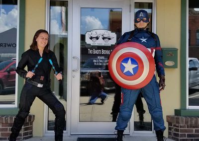 Superheroes in front of brewery